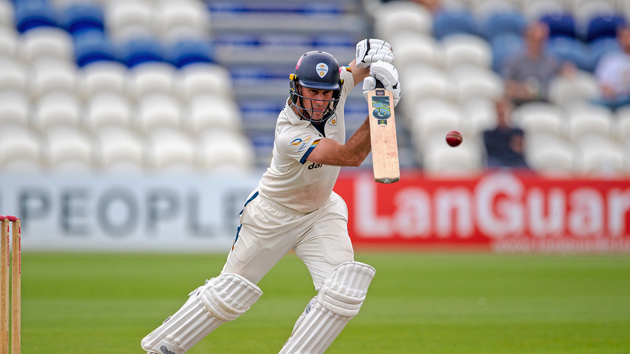 Madsen defies Sussex with unbeaten half-century